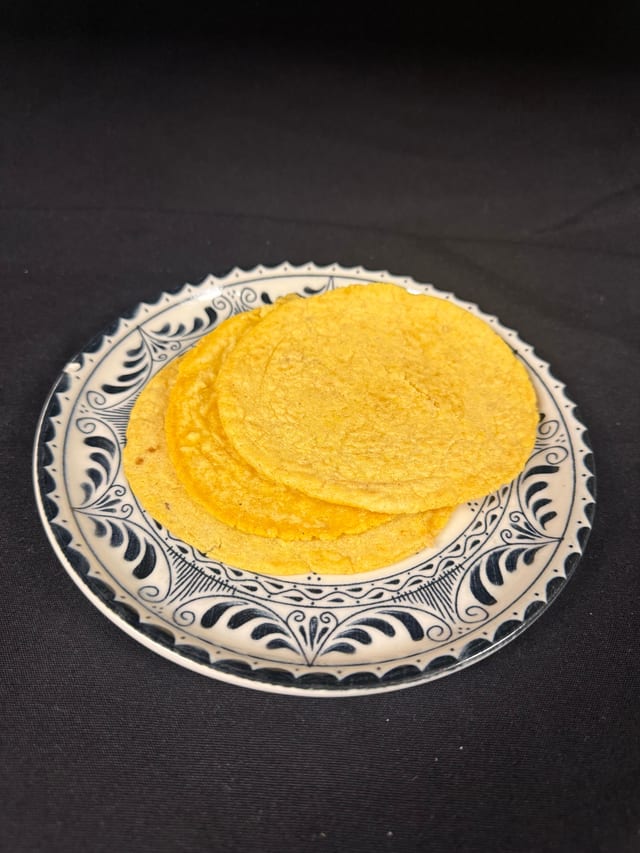 Extra Side Housemade Corn Tortillas.